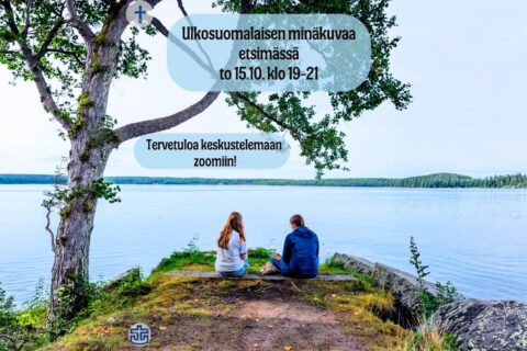 Kaksi ihmistä istumassa vierekkäin koivun alla, niemenkärjessä.